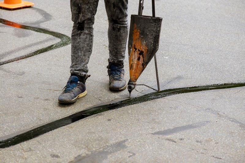 Contractor Applying Sealant